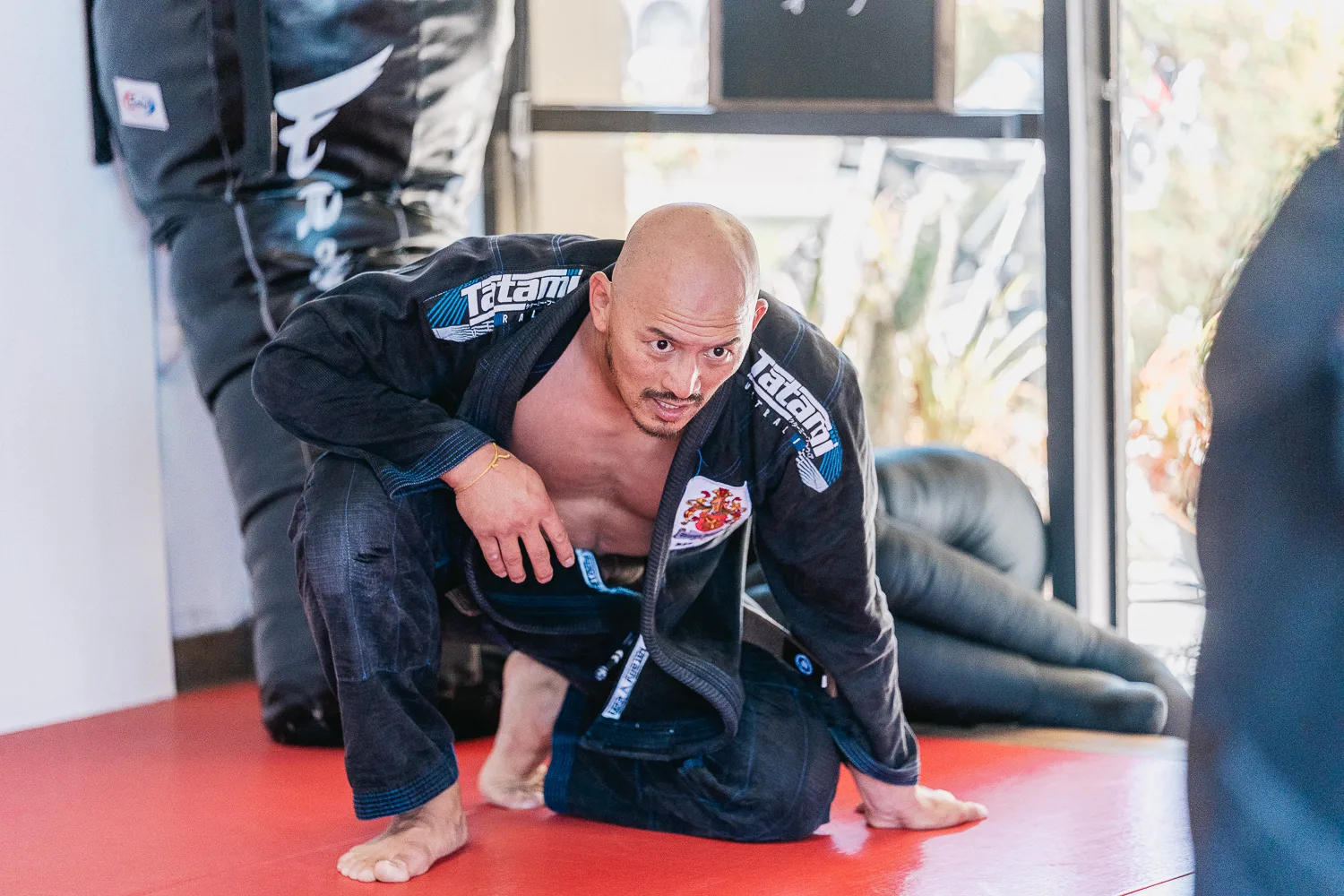 Students practicing BJJ techniques