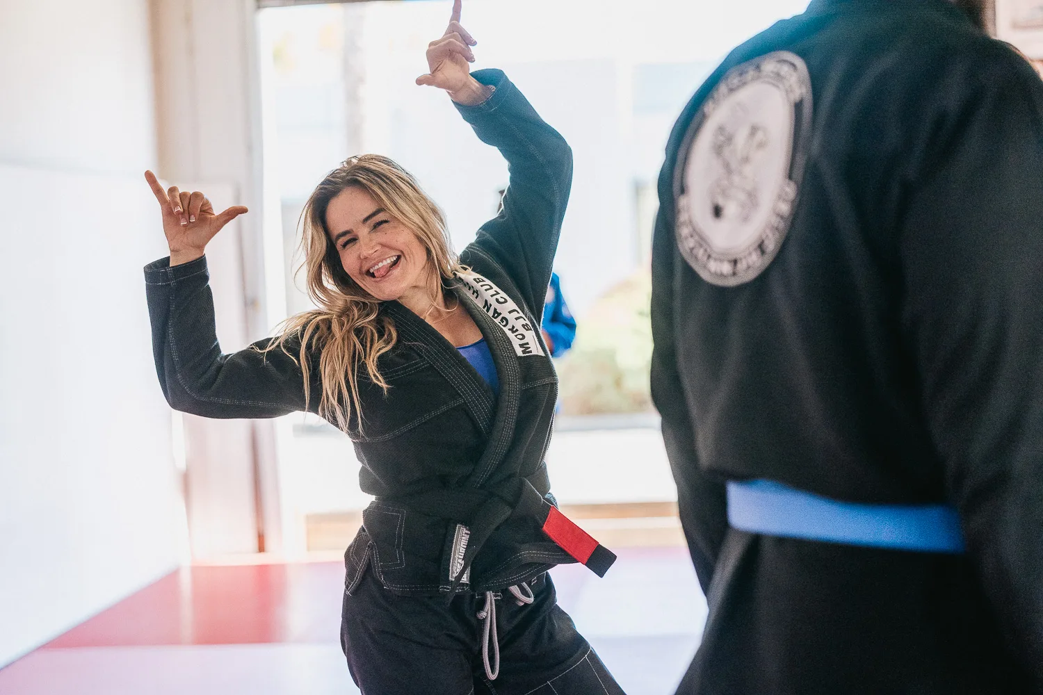 Students practicing BJJ techniques